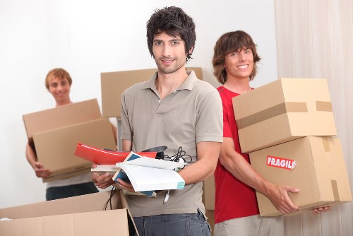 Organised storage unit with packed boxes and furniture