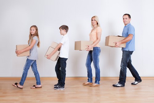 Well-organized storage unit with furniture and boxes in Archway