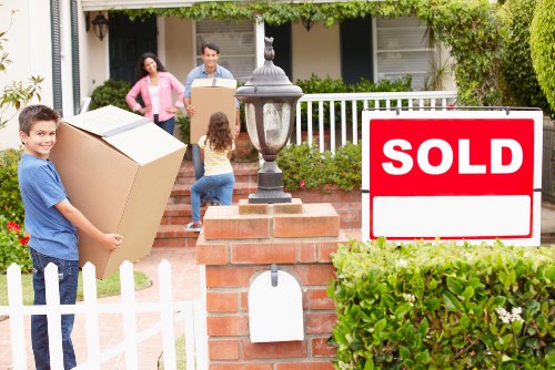 Family packing belongings into mobile self storage in Archway